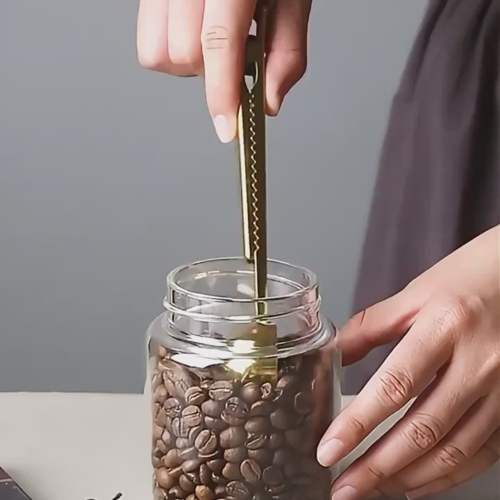 Cuchara medidora de café y clip de cerrado